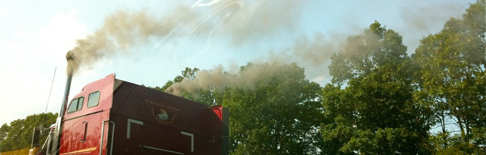 image of a semi truck with diesel plume