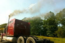 image of a semi truck with diesel plume